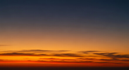 Fototapeta premium Sunset gradient with warm orange fading to navy