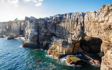 Boca do Inferno, or the mouth of Hell rocky chasm near old  town Cascais, Portugal, in summer day
