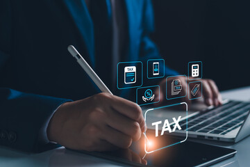Tax and Vat concept. Government, state taxes concept. Businessman calculating to complete Individual income tax return online. Data analysis, financial research.