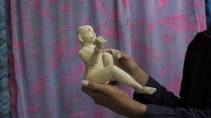 Ancient Handheld Figure - A Touch of History