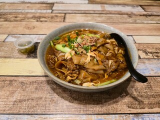 bowl of asian beef hor fun soup