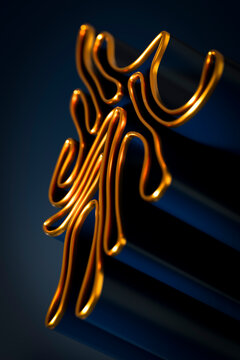 Complex 3D golden maze-like ribbon shape