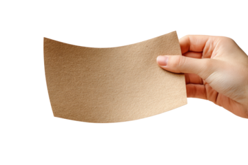 A hand holds a light brown sheet of paper