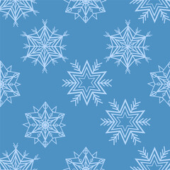 Seamless snowflake pattern on a blue background.Vector pattern for textiles, paper, and Christmas designs.