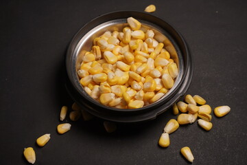 Sweet Corn : Corn kernels are small maize fruits containing a hard shell, dense starch-filled endosperm, and embryo germ essential for growth