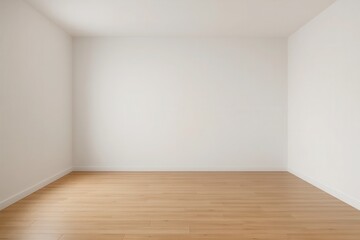 An unoccupied room with pristine white walls and a warm wooden floor, ready for any design or use
