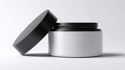 Blank white cosmetic jar with black lid slightly ajar on a clean white background