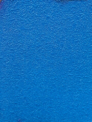 Close-up of a blue textured surface, creating a vibrant, abstract background.