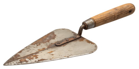 Trowel of Craft: A well-worn trowel, showcasing the marks of skilled craftsmanship and the passage of time, it lies on a surface