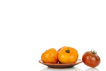 Juicy fresh tomatoes isolated on white background, close-up.
