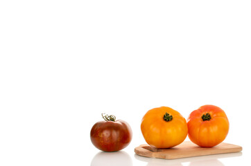 Juicy fresh tomatoes isolated on white background, close-up.