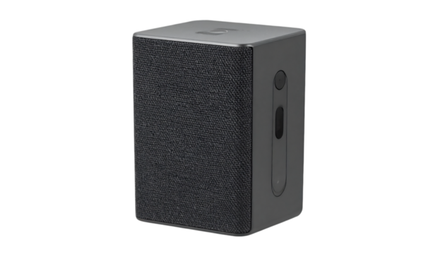 Gray portable speaker with fabric covering, featuring a sleek design and modern aesthetic for audio enjoyment on transparent background