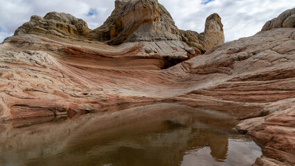 White Pocket in Utah, USA, a remote ecpanse of Navajo sandstone sculpted by wind and erosion into...