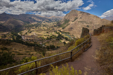 Fototapeta premium The Pisac Ruins are one of the most significant and well-preserved Incan archaeological sites in the Sacred Valley of Peru. Located above the town of Pisac, these ruins offer a fascinating glimpse