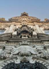 Baroque church facade with sculptures in porto city, portugal