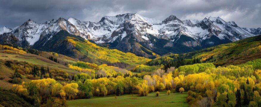 Autumnal mountain vista, with snow-capped peaks and vibrant fall foliage - Powered by Adobe