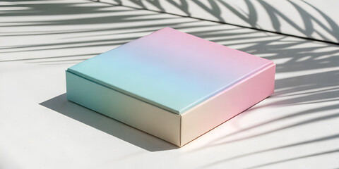 Minimalist pastel gradient square product box with soft shadows on white for sleek packaging visuals
