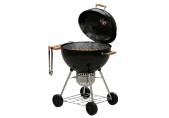 Isolated Black Charcoal Grill with Open Lid and Cooking Utensils
