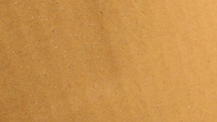Brown blank paper texture background macro close up view, grain paper texture, dots, speckles, specks, flecks and particles. 