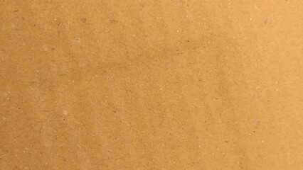 Brown color paper shown grain details on  it surface. Vector cardboard realistic background. Texture of kraft paper.