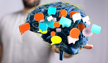 Abstract image of a brain with colorful speech bubbles, representing communication, ideas, and thought processes.