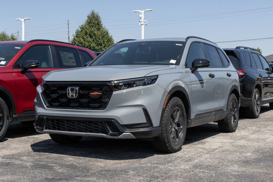 Honda CR-V Hybrid AWD TrailSport compact SUV display at a dealership. Honda offers the CRV with a 2.0L Hybrid engine. MY:2026