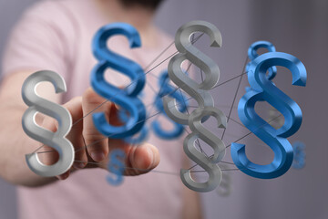 Abstract image of interconnected paragraph symbols representing legal networks, law, and...