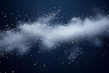 White powder explosion on a dark navy blue background