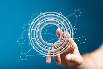 Hand interacting with a digital circular chart showing data percentages. Futuristic technology concept.