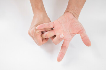 Hands of a man and a woman on a white background.