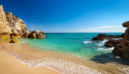 a serene beach scene featuring clear turquoise waters lapping against golden sands and rocky formations under a clear sky