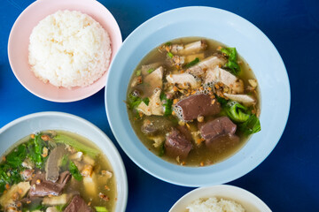 Pork entrails, blood jelly and crispy pork soup with rice. Tom Lued Moo soup, Thai food