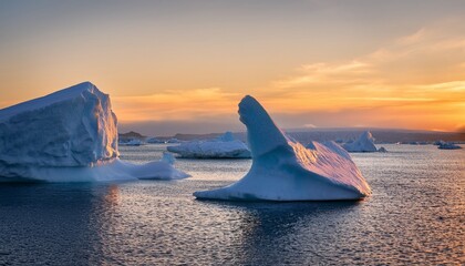 Fototapeta premium stunning icebergs float serenely in tranquil waters under soft sunset glow