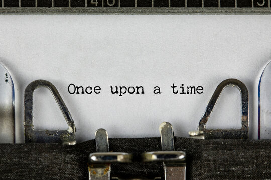 My Story, storytelling and once upon a time typed words on a vintage typewriter. Close up.