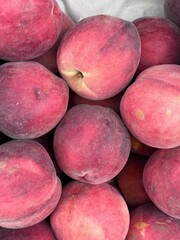 Close-Up of Fresh Ripe Peaches in a Market Display