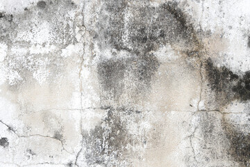 Close up of old stucco cracks on the wall, Old cracked paint on the concrete wall, Weathered paint cracks on plaster. Cracked wall background.