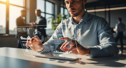 A professional man working on a futuristic digital interface in an office setting