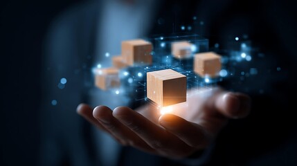 A man presents floating digital cubes in a modern setting, symbolizing innovation and technology.