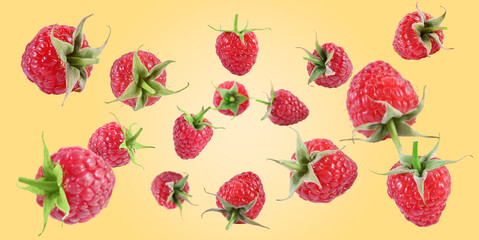 Fresh raspberries swirling in air against pale orange background