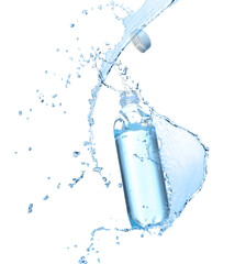 Soda water in bottle and splash against white background
