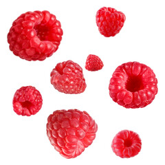 Fresh raspberries swirling in air against white background