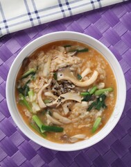 Traditional Korean rice porridge made with Enutari mushrooms and clam meat in savory doenjang (soybean paste) broth. Created by Master Chef Hans Chunseop. Nutritious and rich in umami.