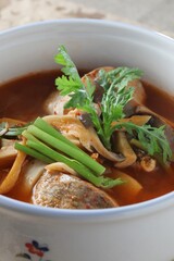 Spicy pollack stew with oyster, king oyster, and enoki mushrooms in Korean style. Dish by Master Chef Hans Chunseop.
