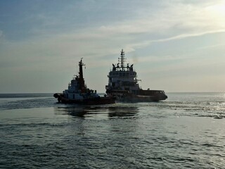 Two Supply ships under sail