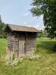 old wooden outhouse