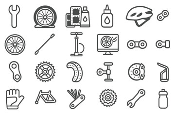 Collection of bicycle repair tools and accessories displayed on a flat surface in a workshop setting