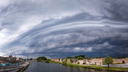 Dramatic storm clouds over urban landscape