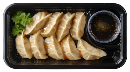 Nepalese Traditional Dish Momo. Authentic Cuisine in Nepal momo over a rustic wooden background.
Steam-cooked momos with sauce.