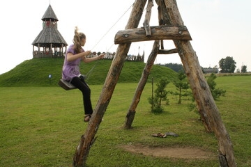 girl on a swing in the park