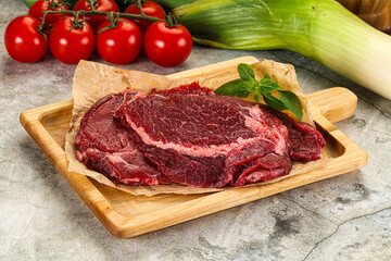 Raw beef cheeks cut for cooking